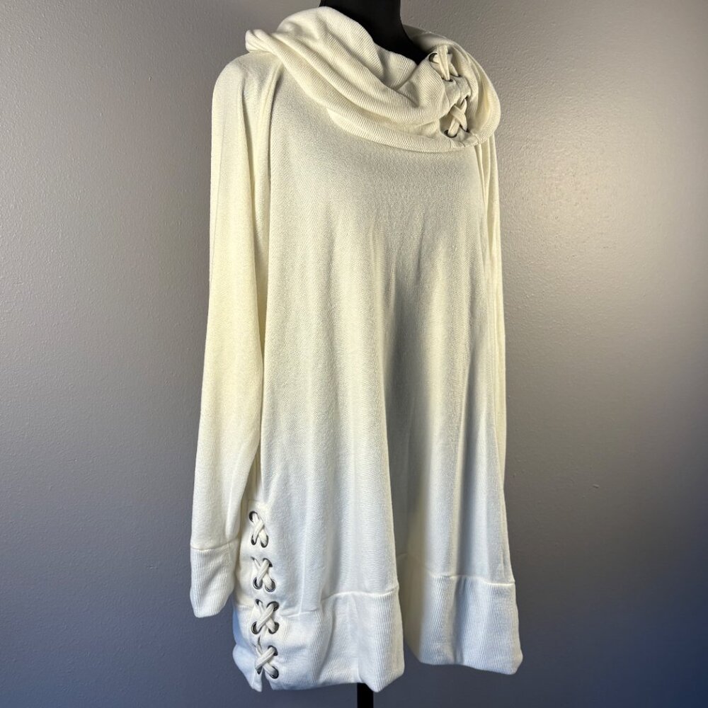 Sweater with shoelace type design